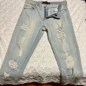 Express Light Wash Ripped Mid Ride Girlfriend Jeans. Size 10 (28inches)